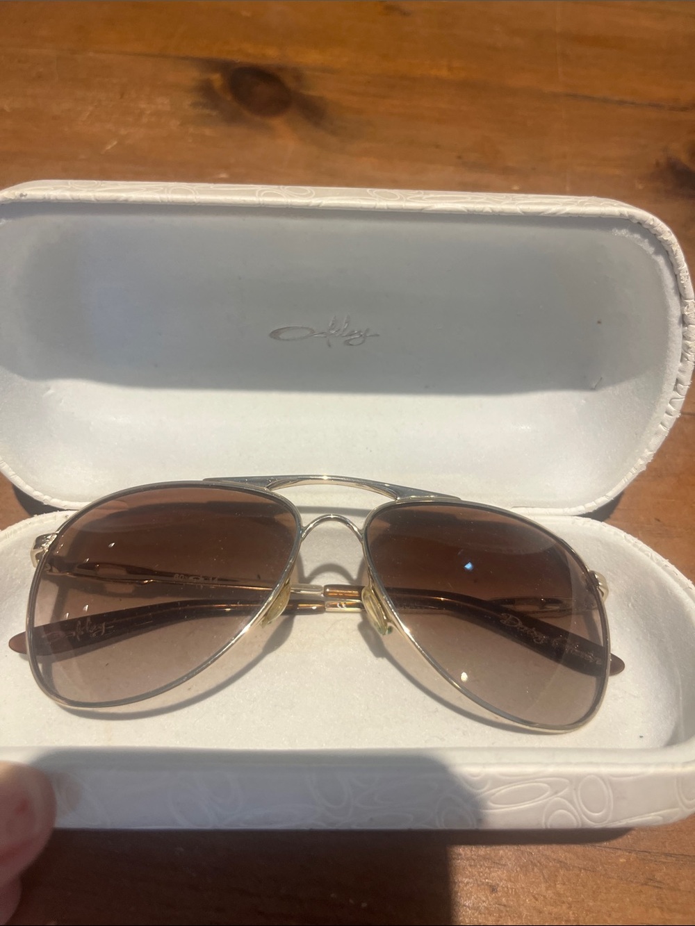 Oakley Aviator Sunglasses with Brown Gradient Lenses and Gold Frame